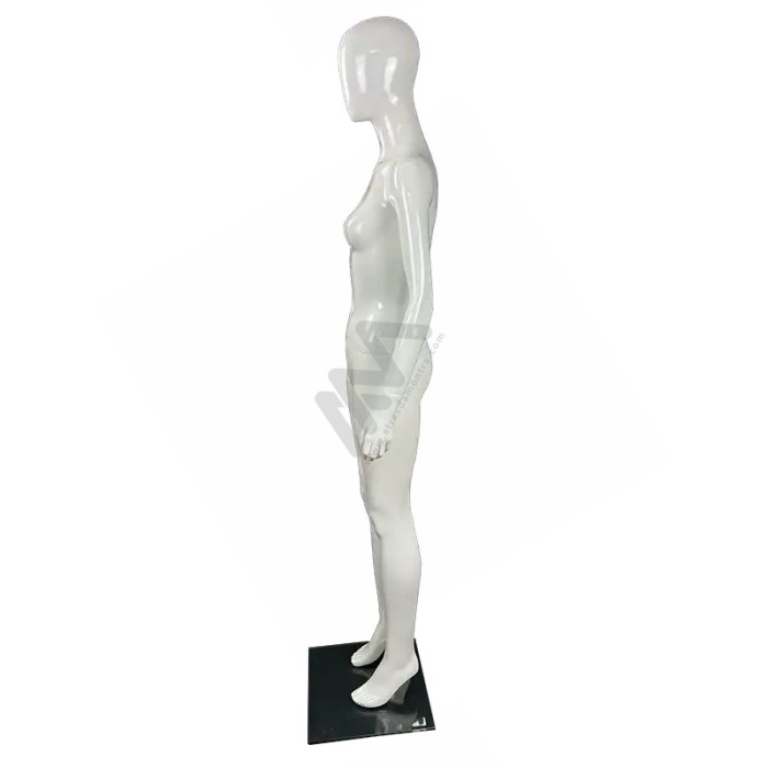Female Mannequin with white head.